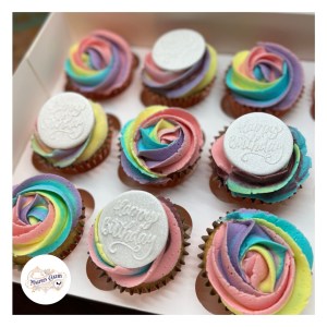 Pastel rainbow buttercream piped cupcakes, Magpies Cakery, local cake maker & decorator for Lincoln & Newark