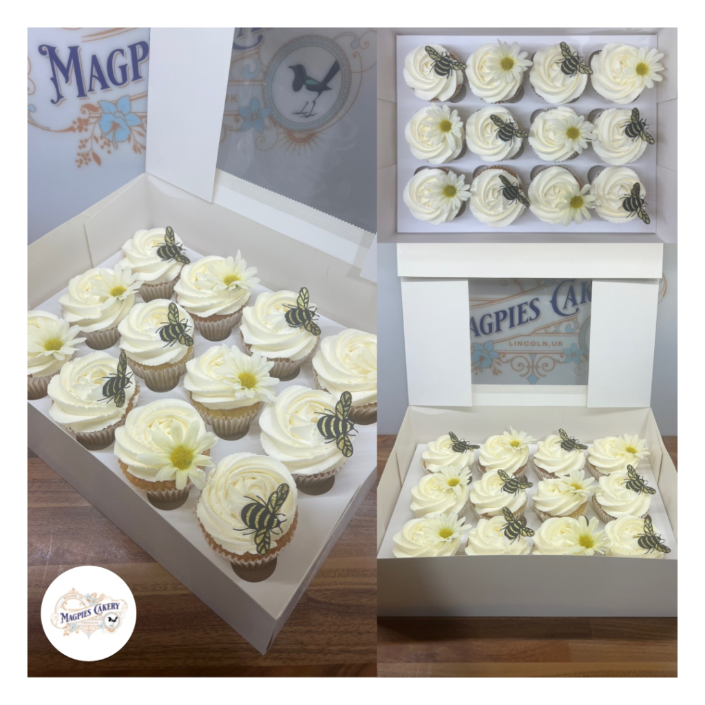 Bee & daisy inspired cupcakes. Buttercream finish cake with faux daisies and personalised bee card toppers. Magpies Cakery, cake maker & decorator, Lincoln & Newark UK